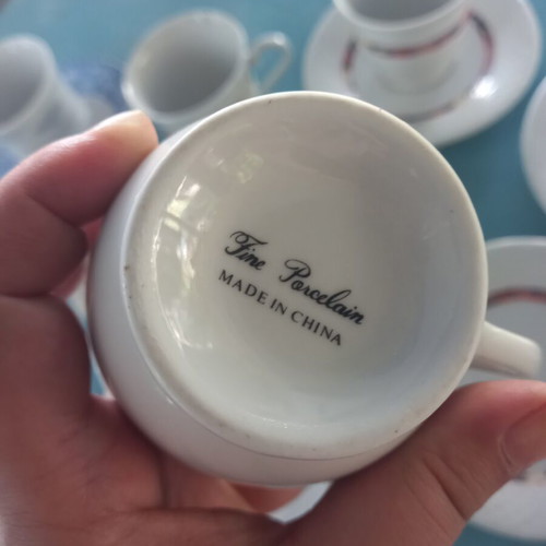 Set of 7 assorted cups and saucers