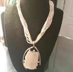 Necklace like new, beige