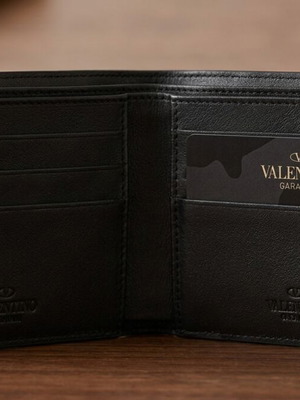 Valentino Garavani men's leather wallet, black with camouflage detail