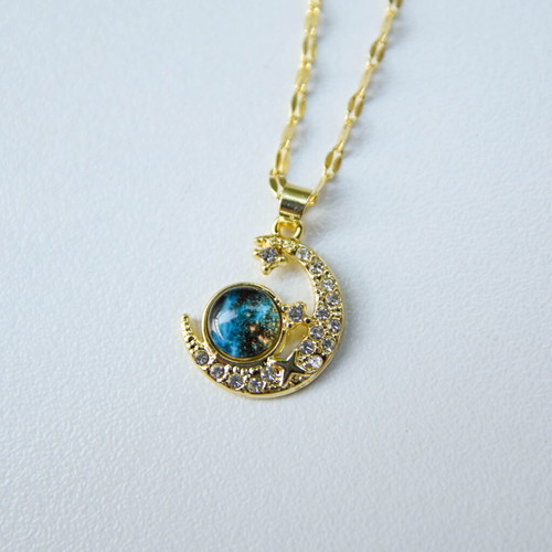 Stainless steel necklace like new with crescent moon and blue sphere