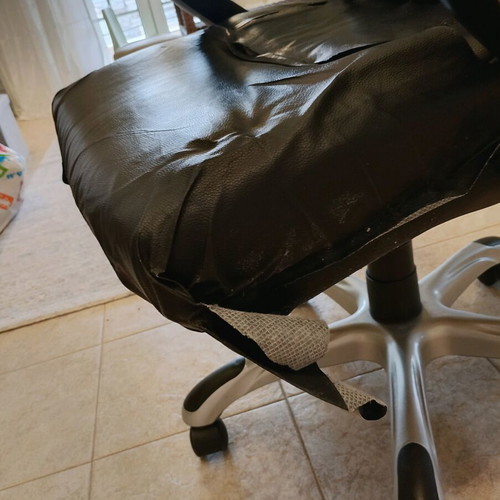 Office chair director used with 3 tears on leather upholstery
