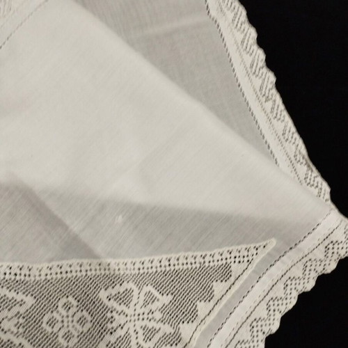 Handmade embroidered doily with crochet used