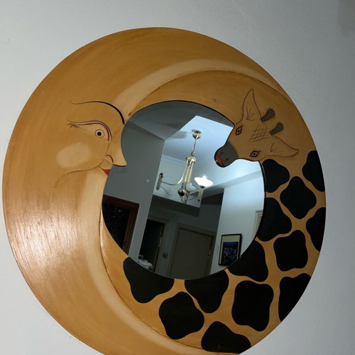Round mirror with moon and giraffe design
