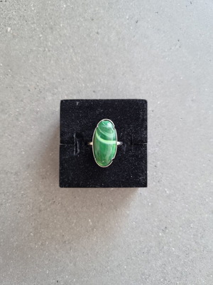 Vintage ring with green oval cut stone