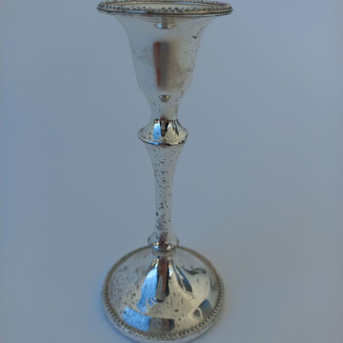 Set of old used small silver-plated candlesticks
