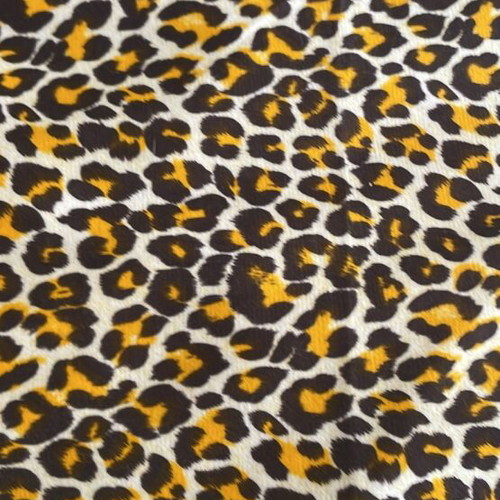 Animal print fabric for upholstery and throws, white with brown and orange