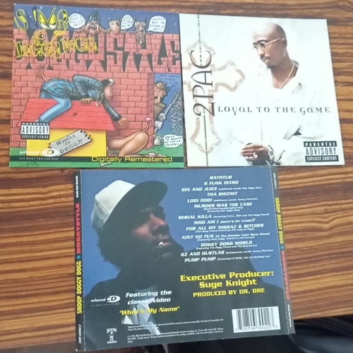 2Pac and Snoop Doggy Dogg booklets used, pack without CDs