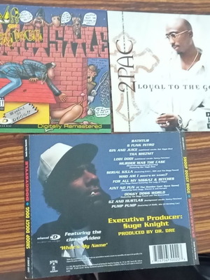 2Pac and Snoop Doggy Dogg booklets used, pack without CDs