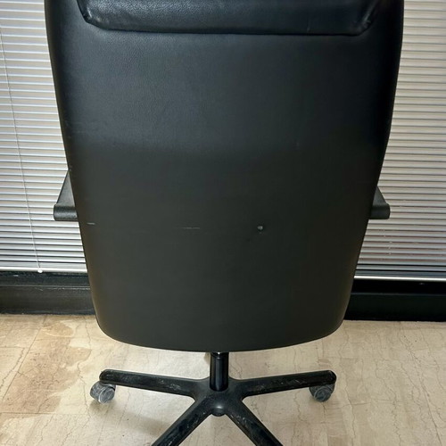 Office chair black leatherette like new with armrests and adjustable height