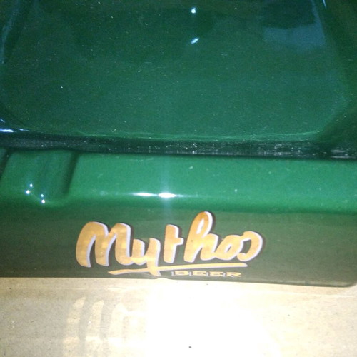 Ceramic Mythos Beer ashtray used with small chip