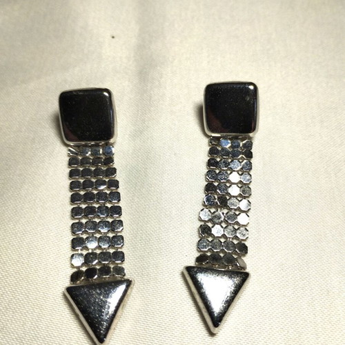 Vintage Silver Earrings used with modern retro style