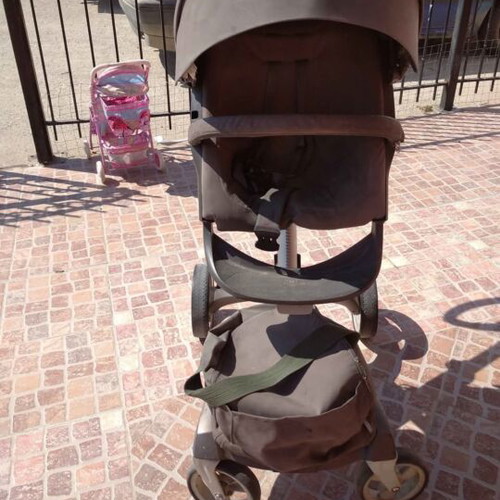 Stokke stroller with scooter, cup holder, umbrella and car seat