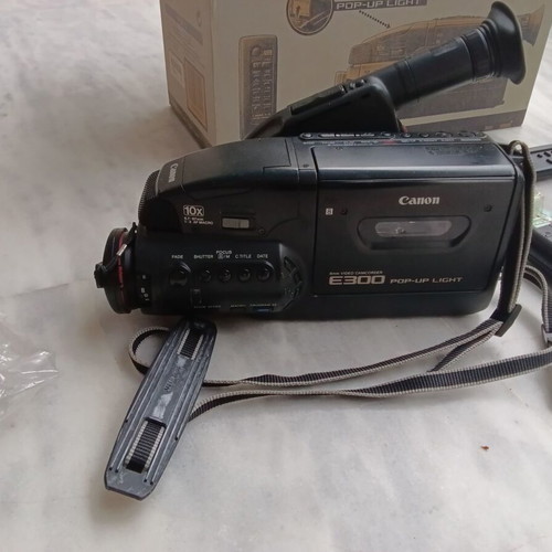 Canon E300 video camera used, non-functional, with accessories