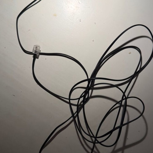 Telephone cable RJ11 black, like new
