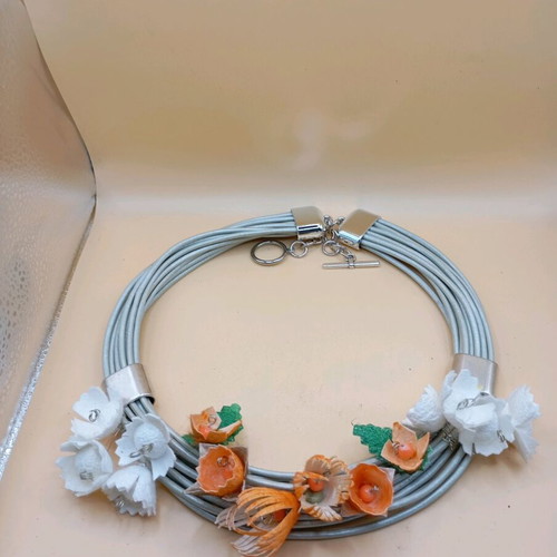 Handmade necklace with dyed silk cocoons in orange and white