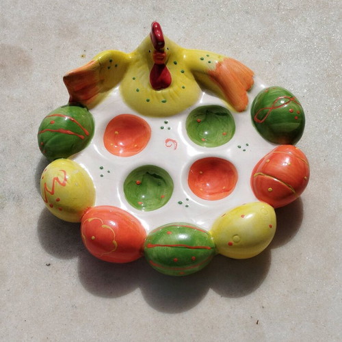 Chicken egg holder with colorful eggs in porcelain new for festive table