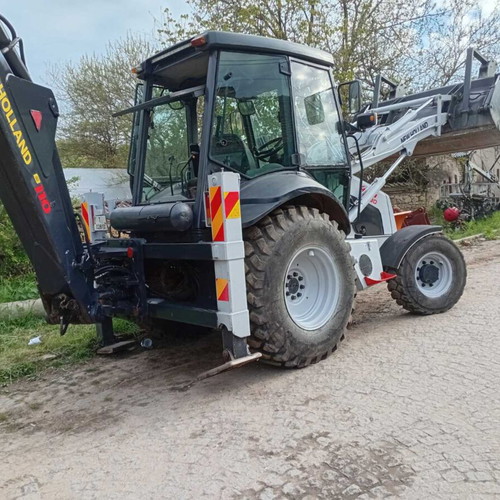 New Holland B 110 backhoe used, 4x4, tires 70%