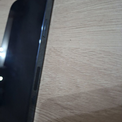 iPhone 12 Pro smartphone with 80% battery health, case included