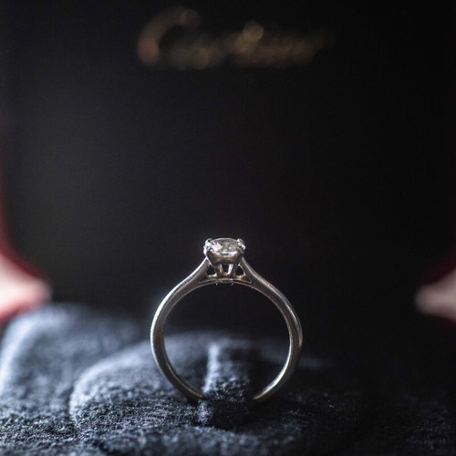 Cartier solitaire ring with diamond like new