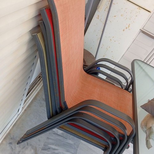 Metal table with chairs set used, large for veranda