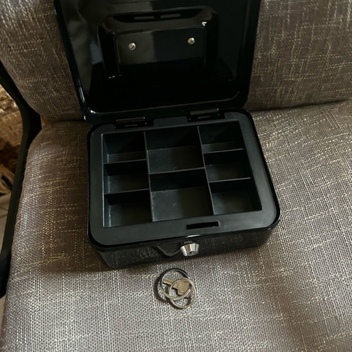Safe like new with key for money and valuables