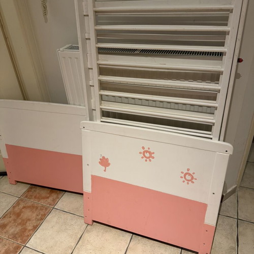 Wooden baby cot, white and pink with side rails