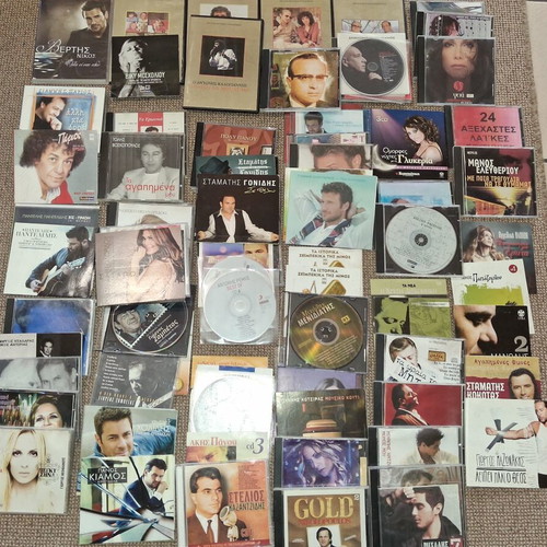 Music CDs used, pack of 100 with various Greek artists