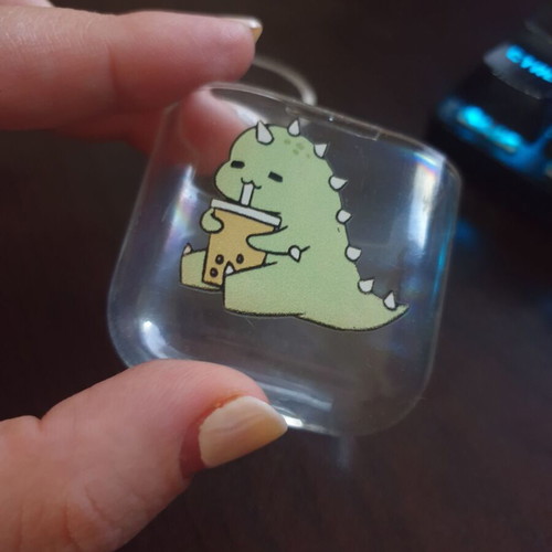 Transparent AirPods case like new with dinosaur design