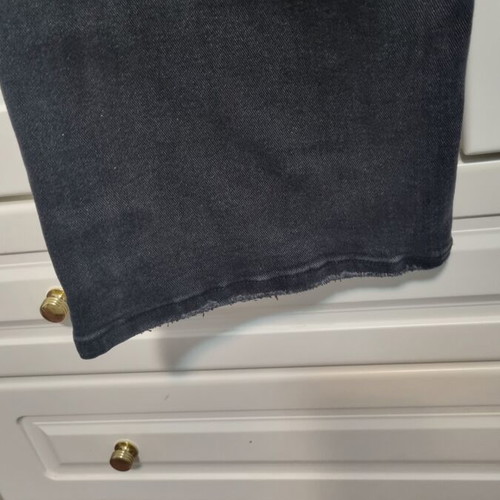 Jean with crooked button fastening black size small, new with tags