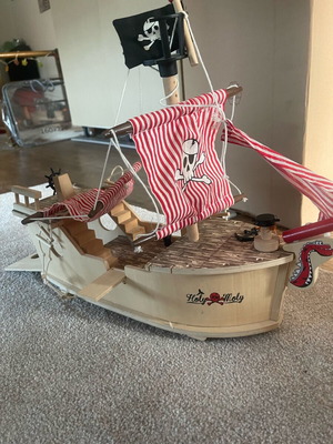 Wooden pirate ship used with small break and marker stains