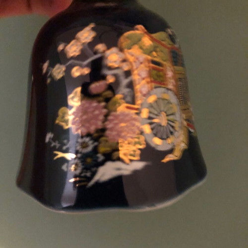 Porcelain bell with hand-painted design like new