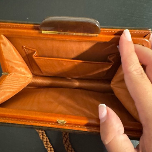 Vintage clutch used, leather inside and tortoise shell outside