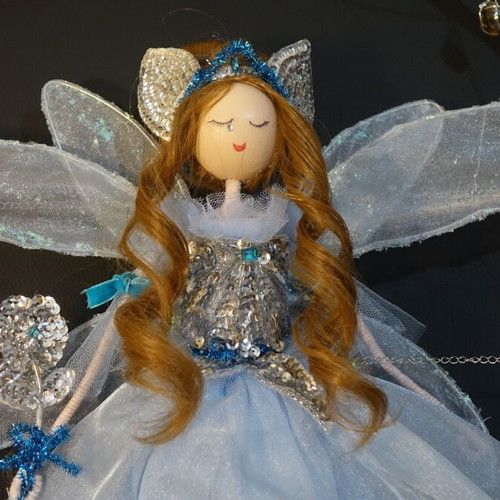 Blue fairy handmade doll in circular frame new
