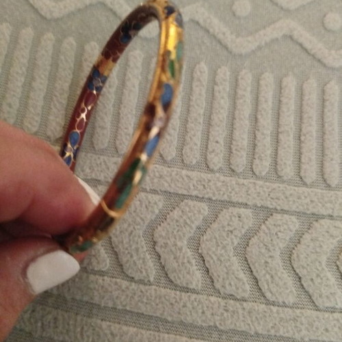 Metal bracelet with unique colorful designs like new