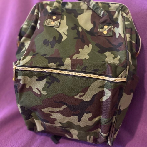 Military backpack like new with multiple pockets brown and green