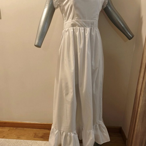 Women's white dress used with open back and nice fit