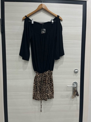 Women's dress new with animal print and open shoulders