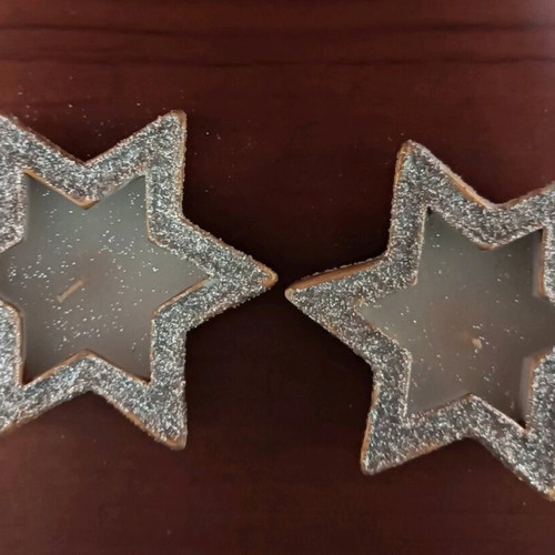 Christmas candles in clay stars with silver glitter new