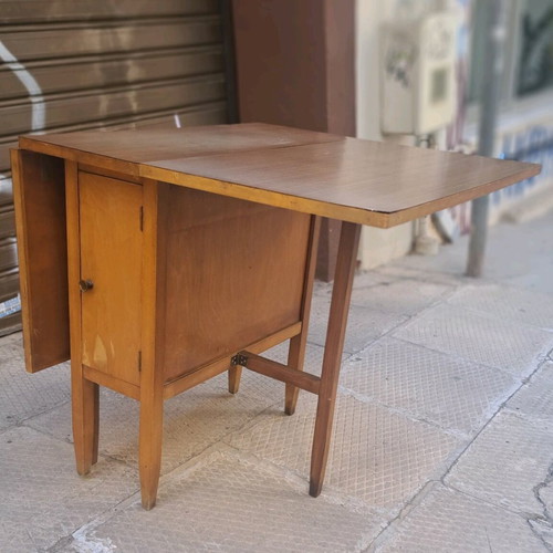 Dining table used with 2 drop-leaves and cabinet with shelf