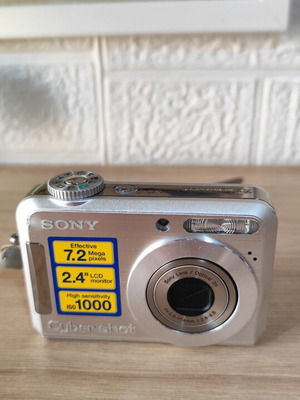 Sony Cyber-shot DSC-S700 digital camera used with memory card and batteries