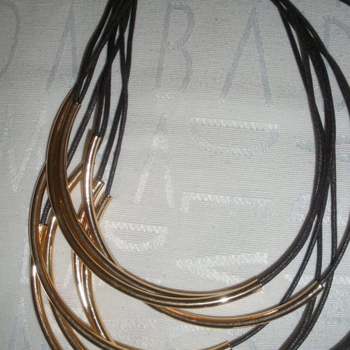 Women's jewelry set with gold-tone metal elements, boho-minimalist style