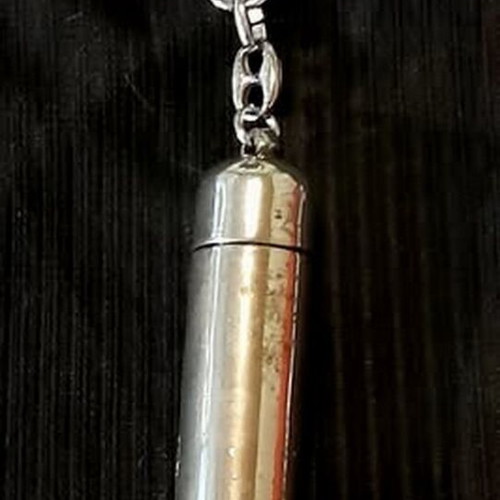 Cigar Accessories vintage set with metal case, fuel canister, and leather keychain