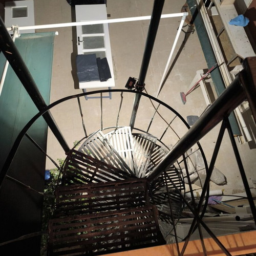Iron spiral staircase, outdoor, green cypress color