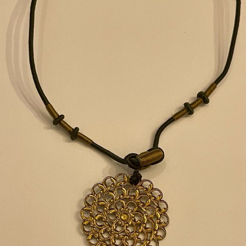 Necklace with gold-colored pendant like new
