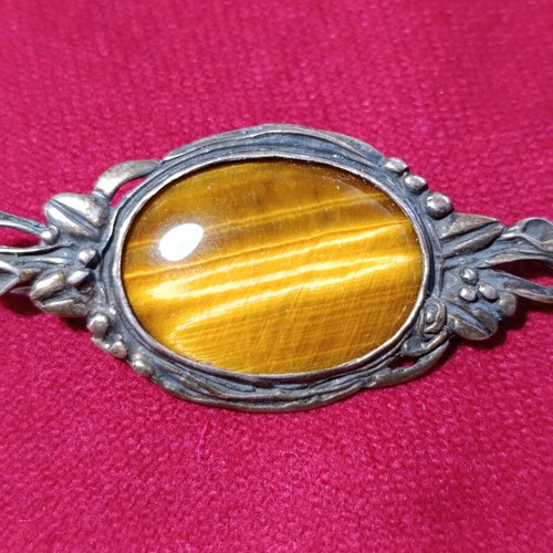 Vintage brooch with tiger's eye semi-precious stone, sterling silver used