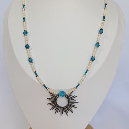 Blue Orbit necklace new with turquoise beads and solar element