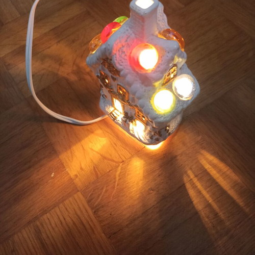 Small white church-shaped lamp with multicolor lights like new
