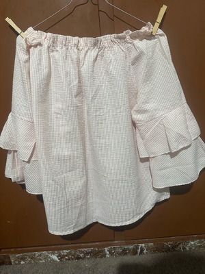 Women's blouse like new with ruffles on sleeves and off shoulders, white and pink
