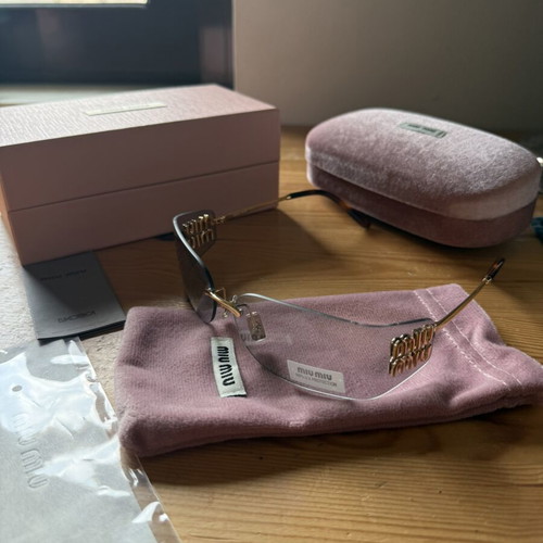 Miu Miu sunglasses, grey and gold