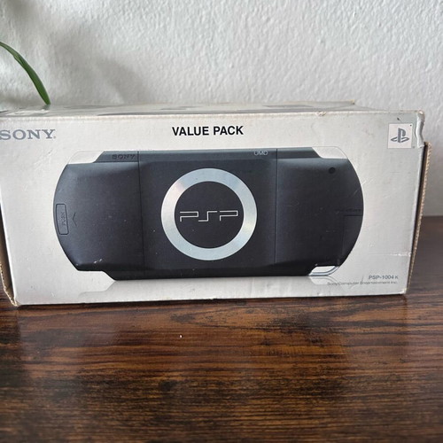 Sony PlayStation Portable PSP-1004 used with original box and accessories